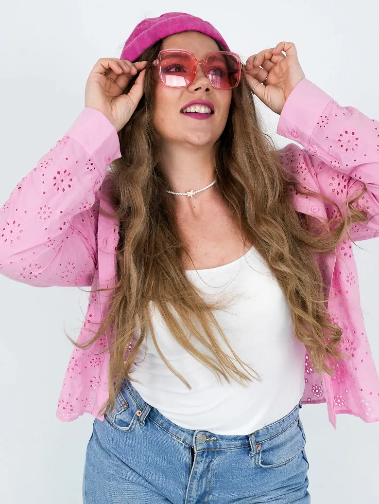 Chiki Piki team member styled in pink with shades